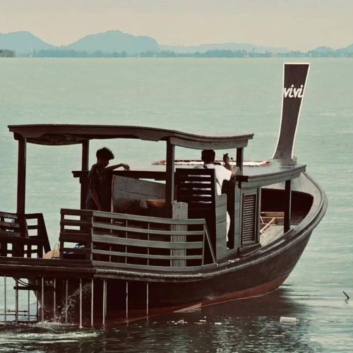 Luxury ViVi classic Thai wooden boat for private charters to Pig Island and Koh Tan